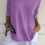 Paris™ Blusa de punto con escote en V