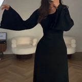 Elegante vestido de punto con lazo en la cintura