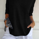 Anna - Top de malla con cuello en V