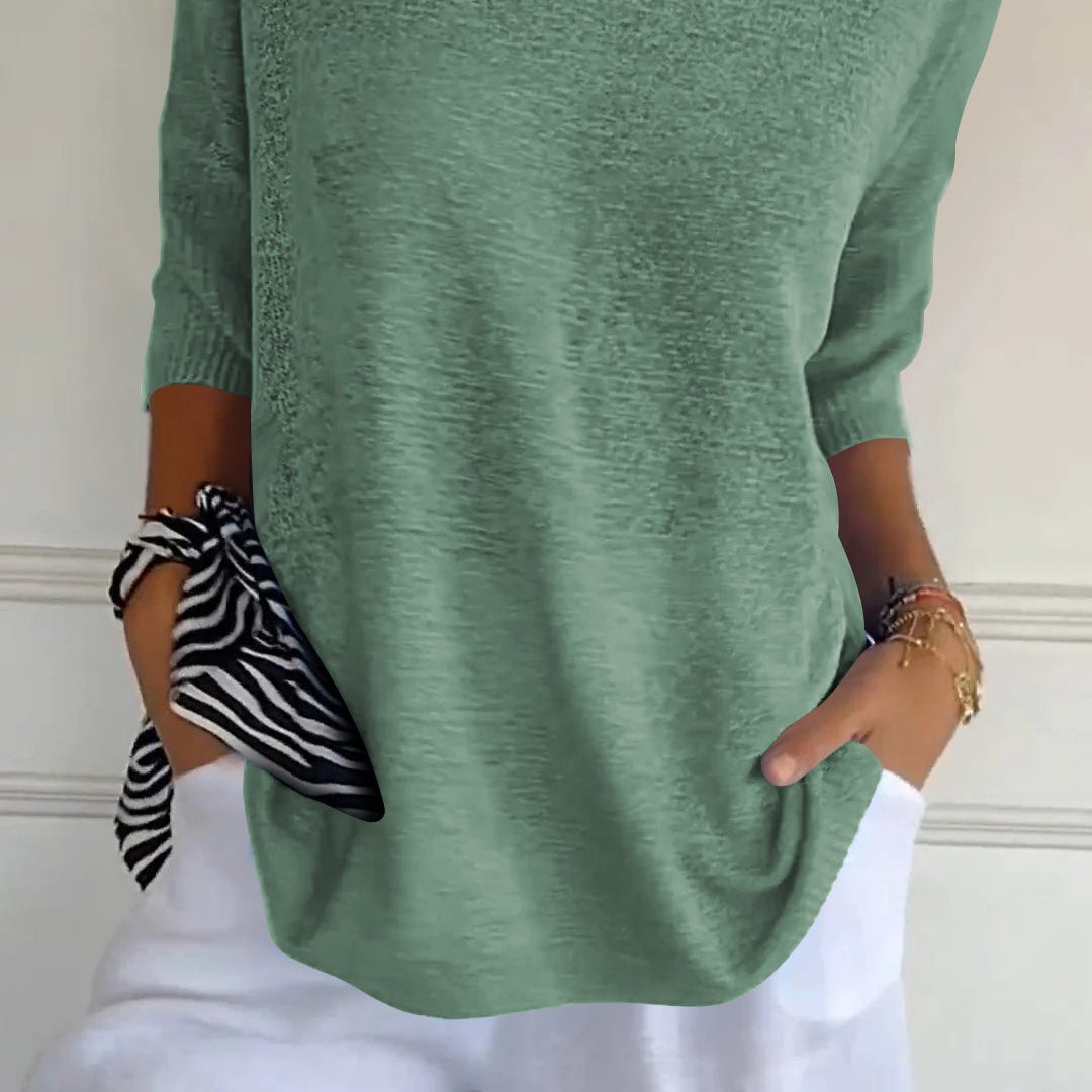 Anna - Top de malla con cuello en V