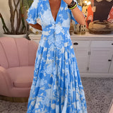 Carine | Vestido con cuello en V y bolsillos con estampado floral