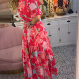 Carine | Vestido con cuello en V y bolsillos con estampado floral
