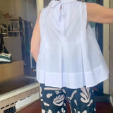 Sana – Blusa lisa sin mangas de estilo minimalista y chic