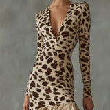 Carmen · Vestido de Mujer con estampado animal y volantes