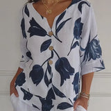 Delphine - Elegante blusa floral