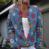 Tilda | Cárdigan azul con estampado floral