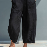 Claudia | Mono minimalista de lino para mujer, sin mangas, cuello alto y botones