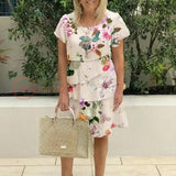 Giselle™ - Vestido plisado con volantes florales
