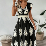 Candela - Vestido maxi barroco con escote en V para Mujer