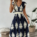 Candela - Vestido maxi barroco con escote en V para Mujer